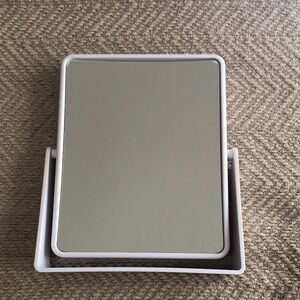 White Vanity Mirror with Minimalist Design and Elegant Finish